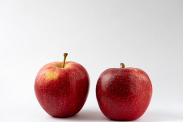 Two red apples against a white background. Royal gala apples. Food product photography