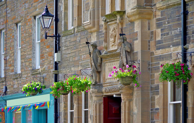 Romantic backstreet alley street in historic old town of Kirkwall, Scotland with beautiful house facades, popular travel destination on the Orkney Islands