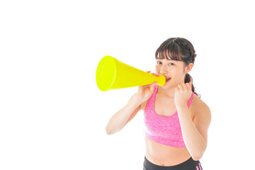 スポーツウェアで応援する若い女性