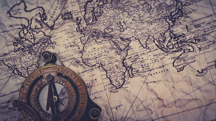 Fototapeta na wymiar Compass On Old World Map