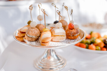 Mini burger canapes on a table