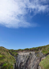 Fototapeta na wymiar Cliffs and rocks at south east coast of Ireland.