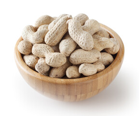 Raw peanuts in wooden bowl isolated on white background with clipping path