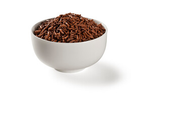 Simple white bowl filled with chocolate sprinkles, isolated