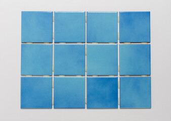 Group of simple light blue tiles, isolated