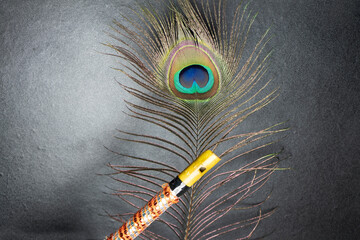 krishna  Flute and peacock feather. Krishnastami Special. krishan janamashtami, krishna jayanti. Venna Donga - Image - obrazy, fototapety, plakaty