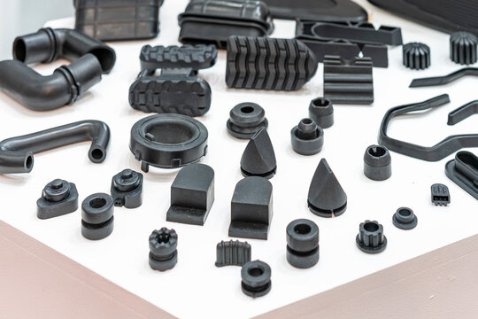 Various compression molded rubber sample parts made from manufacturing process in industrial e.g. plug cover cap pipe tube pedal nozzle connector and automobile parts other