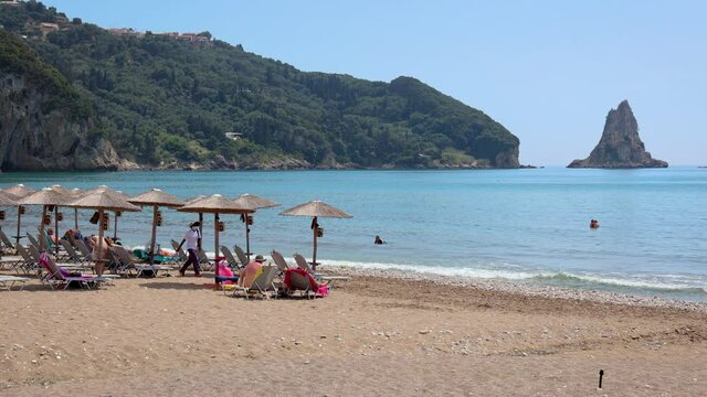Ai Gordis beach in Agios Gordios town on a Ionian Sea coast on a Greek Island of Corfu, 4k video