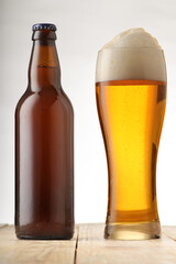 beer bottle with a full mug