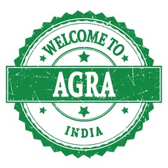 WELCOME TO AGRA - INDIA, words written on green stamp