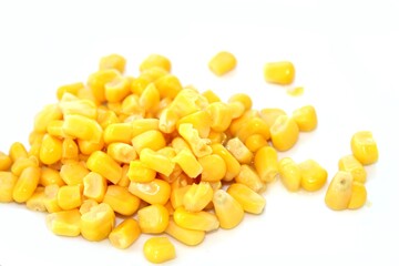 Corn seeds on white background, cooked sweet corn, top view