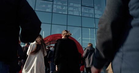 Office workers rush to work.