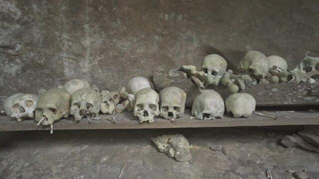 Tampang Allo, Tana Toraja, Indonesia - Tau Tau Human Skulls Piles of Bones Burial Graves Cave