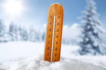 Winter background of snow and thermometer 