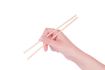 Hand holding chopsticks on white background