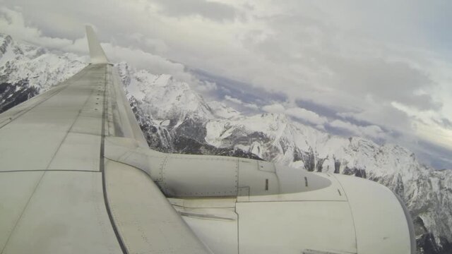 Airplane wing view during turbulence