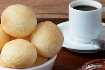 Cheese bread (pão de queijo) and a cup of coffee