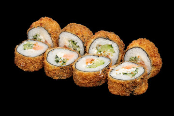 Japanese food: maki and nigiri sushi set on black background. side view composition.