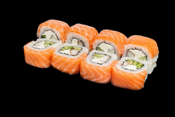 Japanese food: maki and nigiri sushi set on black background. side view composition. © Serhii