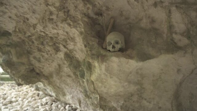 Tampang Allo, Tana Toraja, Indonesia - Tau Tau Human Skulls Piles of Bones Burial Graves Cave