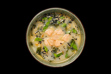 Japanese food: soup on black background. top view composition.