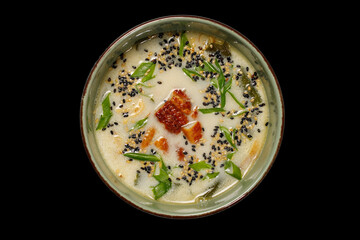Japanese food: soup on black background. top view composition.