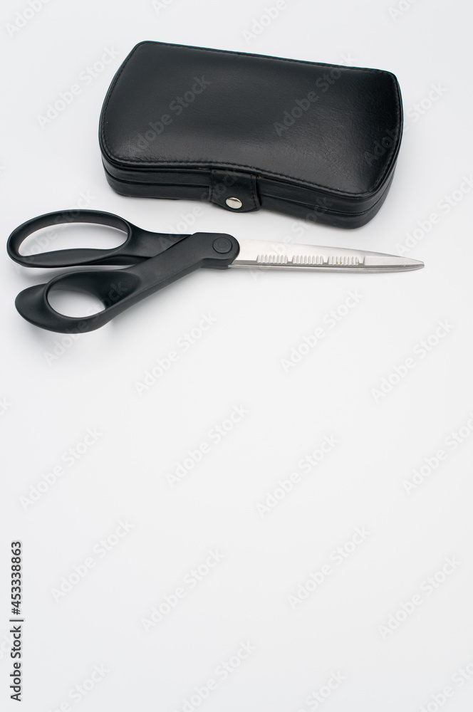 Canvas Prints Black closed manicure set bag and scissors with copy space at the bottom