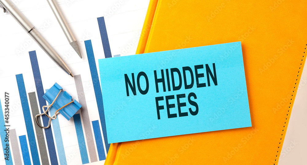 Poster no hidden fees text on sticker on the yellow notebook with chart and pen