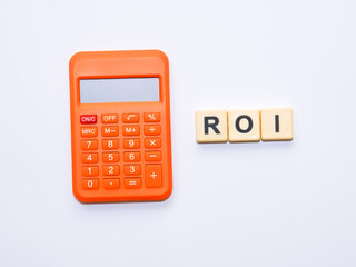 An image of calculator and square alphabets "ROI" isolated with white background.