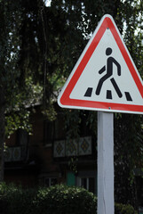 pedestrian crossing sign on the road