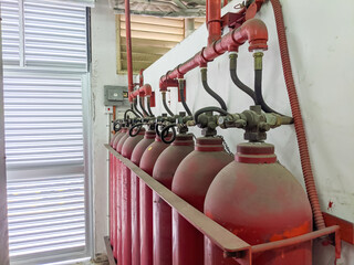 Fire extinguishers are installed at each electrical substation. Selective focus image.