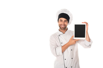 Smiling chef holding digital tablet with blank screen isolated on white