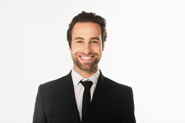 Smiling businessman looking at camera isolated on white