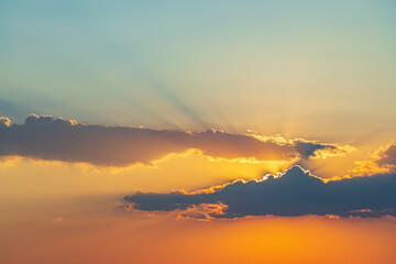 sunset in late summer with colorful clouds
