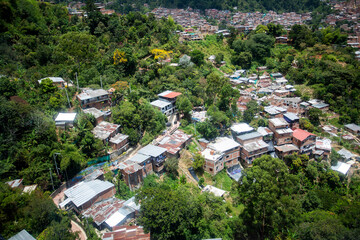 Cityscape of Medellin, Colombia. Houses built on the slopes of the mountains.