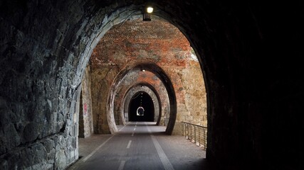 Italy, Spezia, Liguria - The new pedestrian walk , cycle path ( bicycle lane ) that connects Framura, Bonassola and Levanto passing through the ancient train tunnels