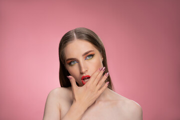 Messing up lipstick on face fashion model beautiful woman with long straight hair standing in the...