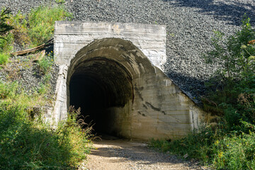 mysterious tunnel in the hillside