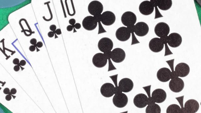 Poker chips cards table winning royal flush,  top view