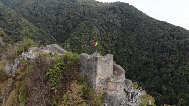Vlad Tepes Dracula Poenari castle on top of the hill 4K drone shot