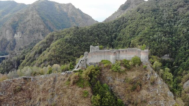 Vlad Tepes Dracula Poenari castle on top of the hill 4K drone shot