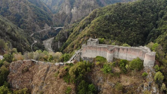 Vlad Tepes Dracula Poenari castle on top of the hill 4K drone shot