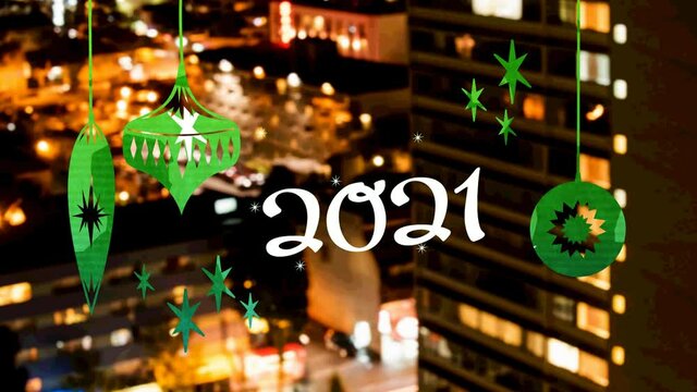 Animation of 2021 text and christmas decoration over blurred cityscape