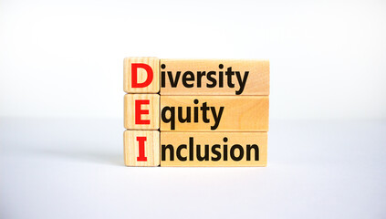 DEI, Diversity, equity, inclusion symbol. Wooden blocks with words DEI, diversity, equity, inclusion on beautiful white background. Business, DEI, diversity, equity, inclusion concept.
