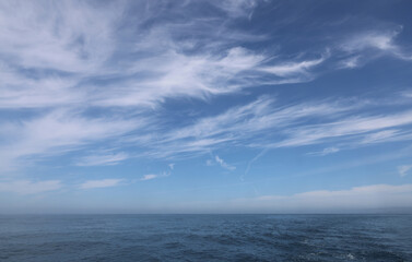 clouds over the sea, blue sky and clouds