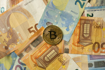 Euro banknotes and Bitcoin