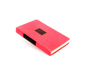 Book in red cover isolated on a white background