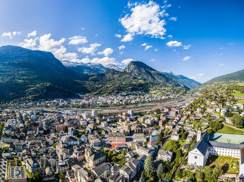 Aerial panorama image of the Swiss alpine town Brig in Canton Valais.