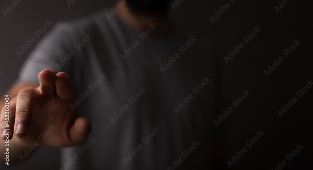 Poster Hand pushing on a touch screen..