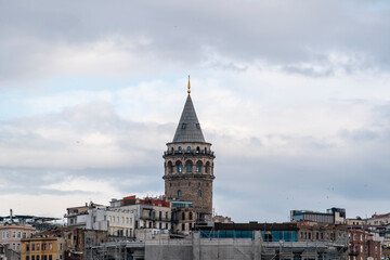 Fototapeta premium Galata tower and old town in istanbul at sunrise